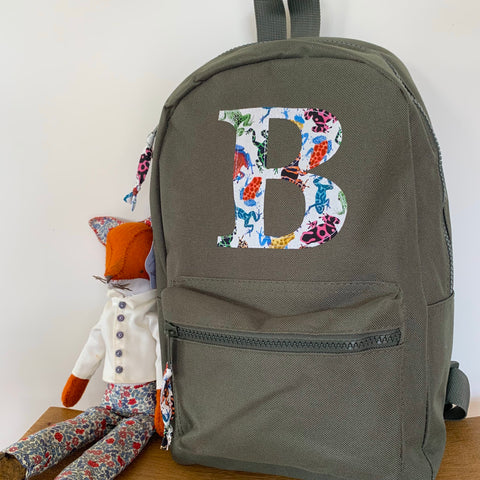 Khaki initial backpack