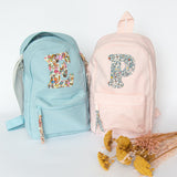 Pale blue initial backpack